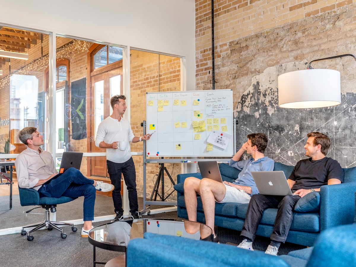 Agency team reviewing campaign creative and launch materials